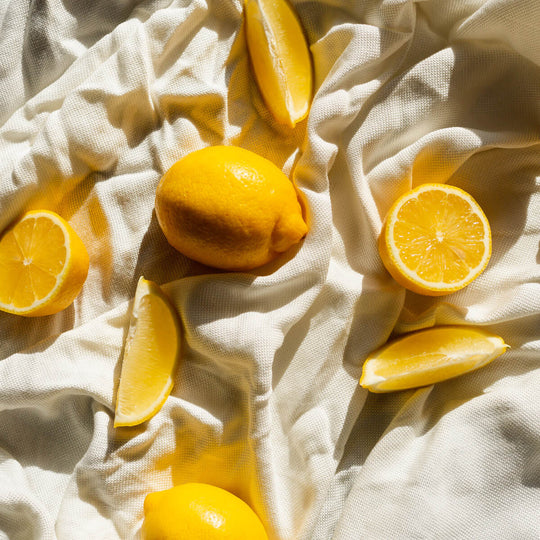 Best Detox Foods. Beautiful image of vibrant lemons shown as detoxing foods. 